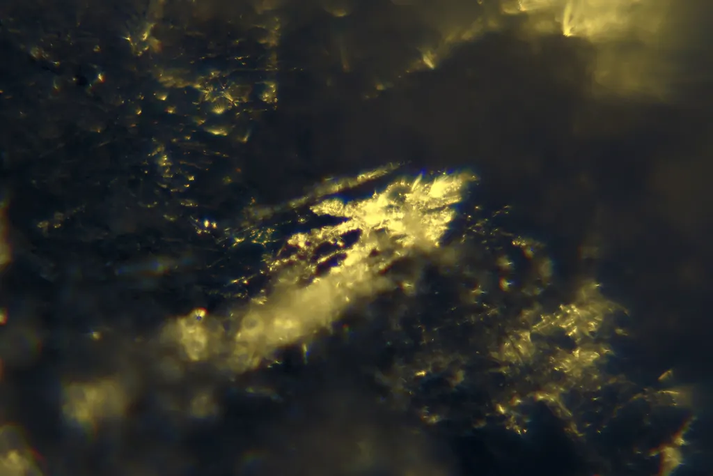 Snow crystals shining in light